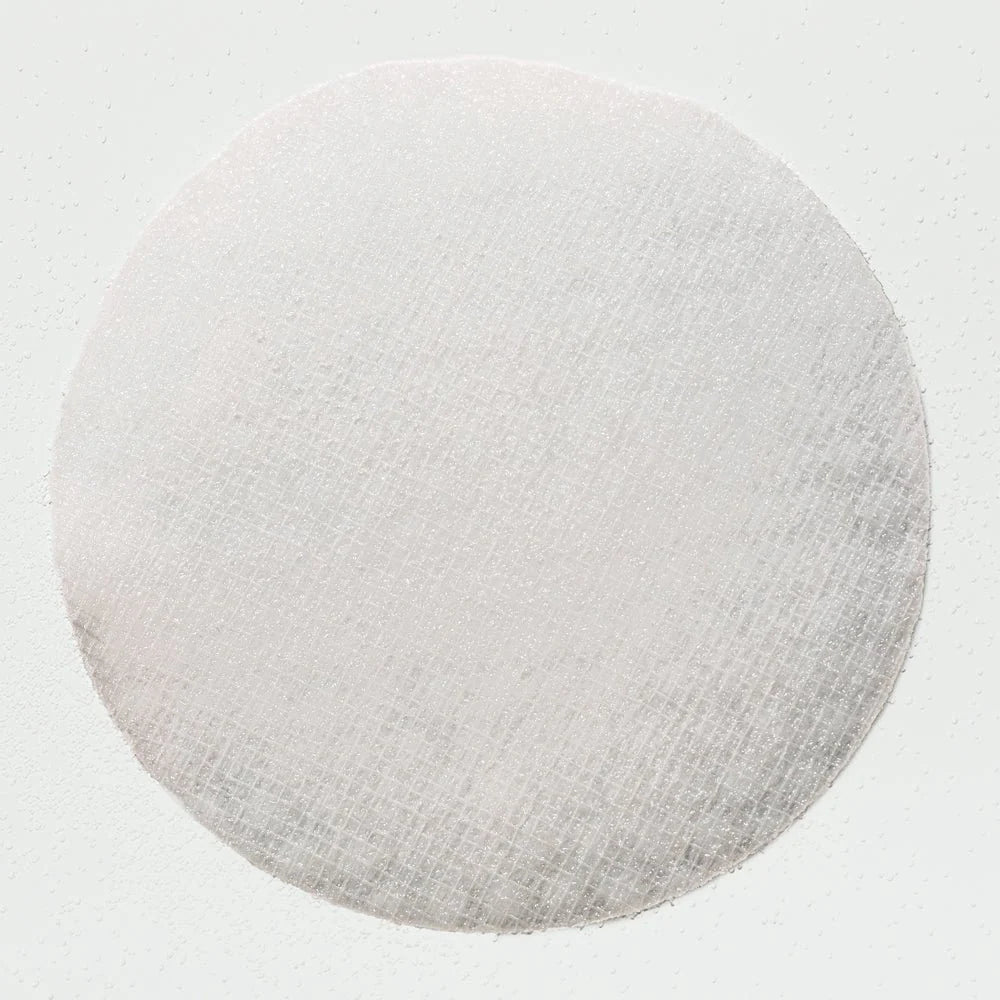 Round gray cushion on a light gray background